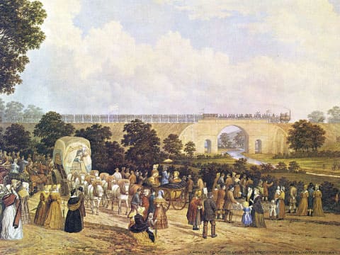 世界初の鉄道を見学する人々の絵